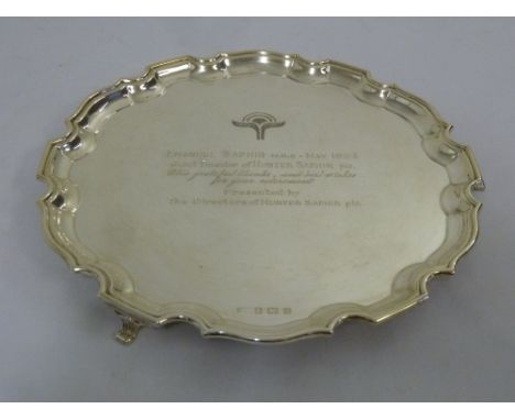 Silver presentation salver, Chippendale border on three fluted bracket feet, Birmingham 1937