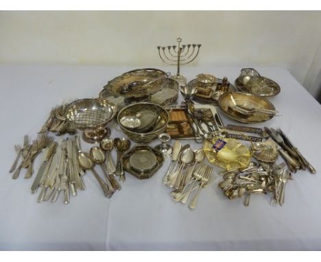 A quantity of silver plate to include dishes, trays, condiments and flatware
