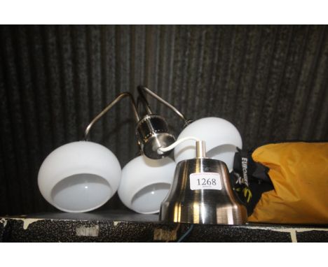 A metal wall light fitting 