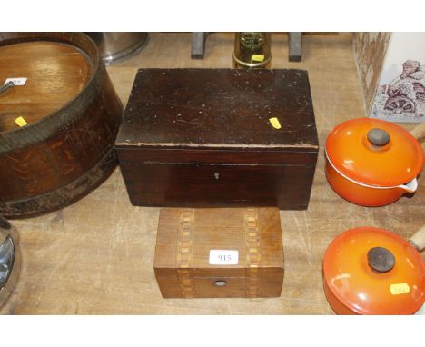 An inlaid tea caddy together with an oak storage box