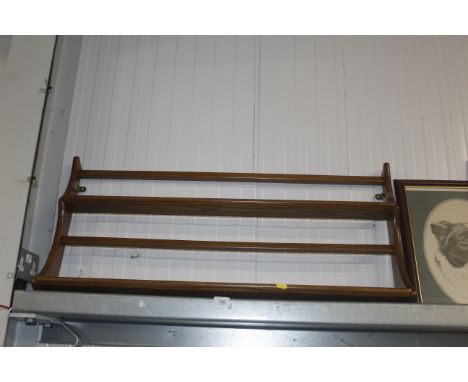 An Ercol wall shelf
