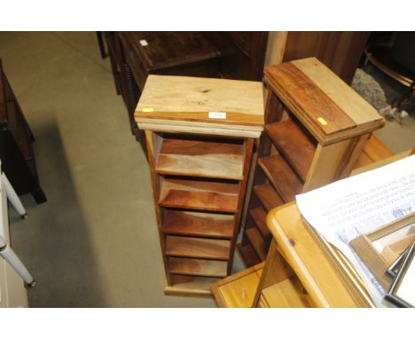 A pair of hardwood shelf units
