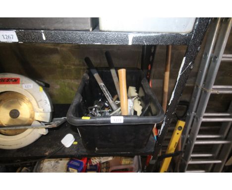 A box containing various tools including hammers, spanners etc 