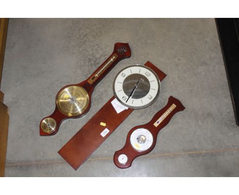 Two barometers and an Acctim wall clock