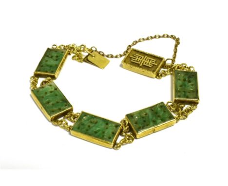 AN ANTIQUE JADEITE JADE &amp; GOLD BRACELET 16cm long, comprising five finely carved jadeite jade rectangular plaques, framed