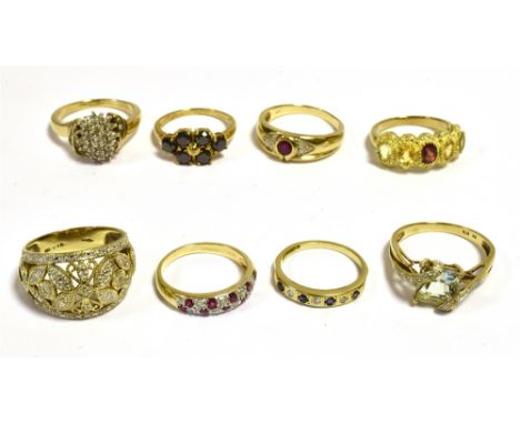 A COLLECTION OF 9CT GOLD GEM SET RINGS  To include ruby and diamond dress rings, sapphire and diamond eternity, aquamarine &a