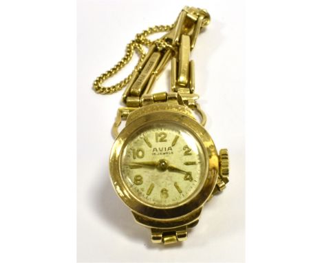 A 9CT GOLD LADIES AVIVA WRISTWATCH  17.0mm round case, stamped 375, manual wind 15 jewels, currently working, with a 9ct gold