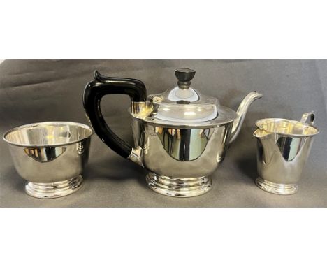 ART DECO BATCHELORS SILVER TEA SERVICE  Comprising, a tea pot, cream jug and sucrier.  Hallmarked Sheffield 1939.  Makers mar