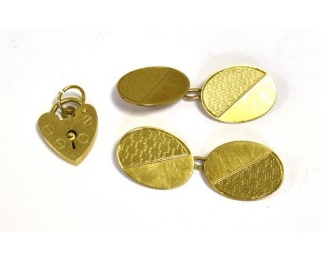 9CT GOLD PAIR OF VICTORIAN CUFFLINKS   Of oval form, decorated with semi-oblique engine turned engraving, hallmarked 375 Birm