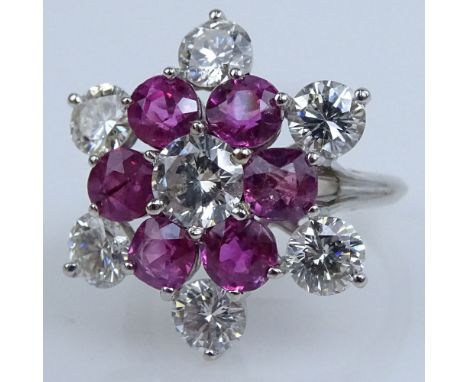 Fine Quality Approx. 2.10 Carat Burmese Ruby, 3.10 Carat Round Brilliant Cut Diamond and 14 Karat White Gold Starburst Ring. 