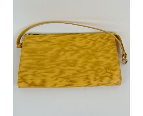 Nice Pre-Owned Louis Vuitton Yellow Leather Wristlet clutch handbag. Monogramed gold tone hardware. Includes dust bag from Th