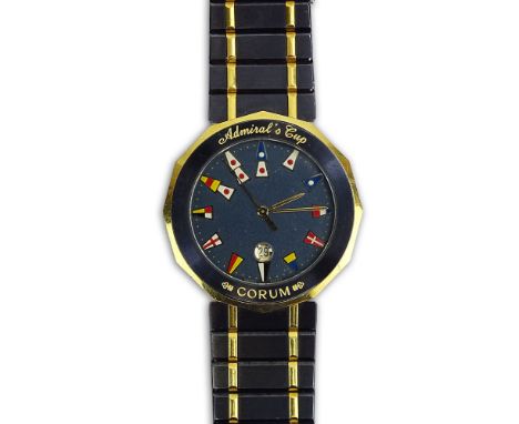 Men's Vintage Corum Stainless Steel and 18 Karat Yellow Gold Admiral's Cup Quartz Movement Bracelet Watch. Minor surface wear