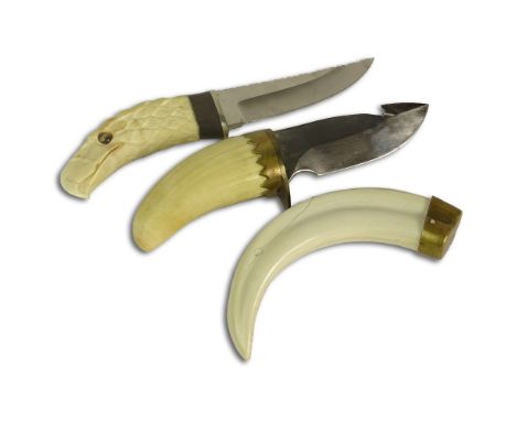 Three piece lot of ivory. Included a carved Ivory handled hunting knife in an eagle motif with tigers eye, artist signed, goo