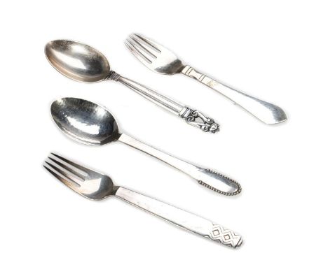Comprising a Jensen Acorn Pattern spoon and a Beaded Pattern spoon, together with two Danish Sterling salad forks 232 grams. 