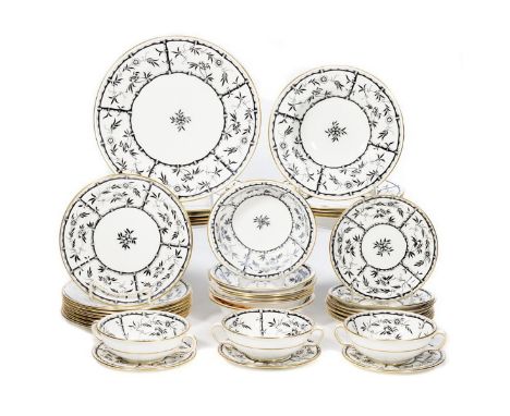  Bamboo and gilt decorated part dinner service including;twelve cream soup, nine 6 in. plates, twelve 7 in. saucers, eight 8 