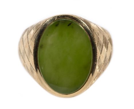 designed with a flat oval jade tablet, measuring approximately 16.8 x 12.5mm, with a textured, woven mounting; weighing appro