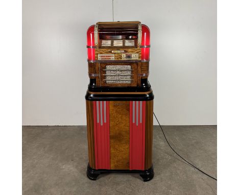 Wurltzer 61 1939 restored original jukebox complete with 12 78 rpm records. Working, comes with stand. Dimensions (H x W x D)