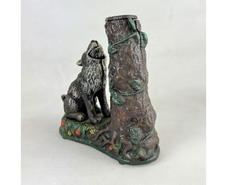 This unique and rustic Howling Wolf Tree Trunk Coin Bank is crafted with intricate detail, featuring a lone wolf sitting at t