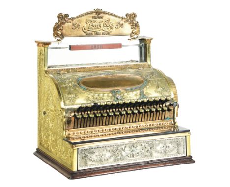 This is a National Cash Register Model 454, serial number 518309. CONDITION: The cash register shows some polishing to the br
