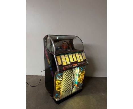 Wurlitzer 1700F Jukebox. Fully working jukebox makes selections, picks up and plays records, amp is working. Dimensions (H x 