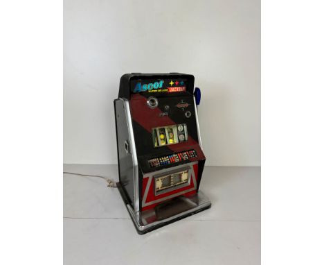 Italian Ascot Super De Luxe Jackbar Slot Machine ca. 1970. In a working condition, comes with keys. Dimensions (H x W x D): 7