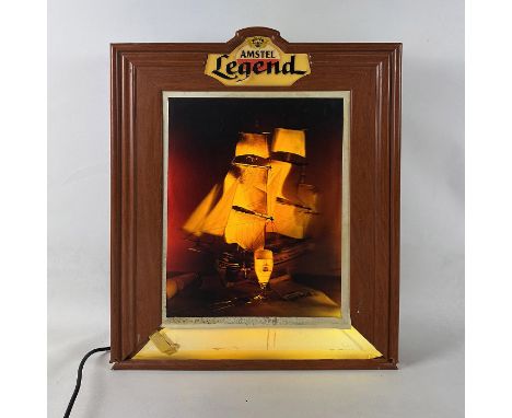 Amstel Legend Dutch Beer Light-Up Sign. In a working condition on 220V power. Dimensions (H x W x D): 55 x 45 x 8 cm. Conditi