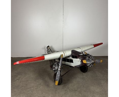 Very Large Metal Scale Model/Decoration Propeller Plane. Dimensions (H x W x D): 67 x 245 x 190 cm. Condition: Very Good. Loc