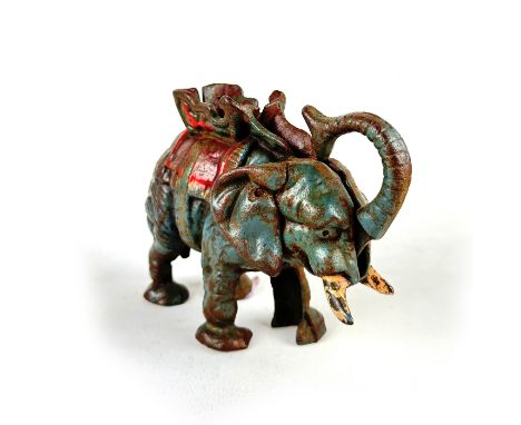 This Antique Cast Iron Elephant Money Bank features a beautifully crafted elephant with a raised trunk, symbolizing good luck