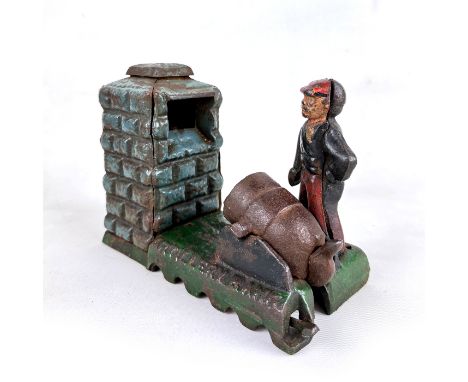 This appears to be an antique cast iron mechanical bank. These types of banks were popular in the late 19th and early 20th ce