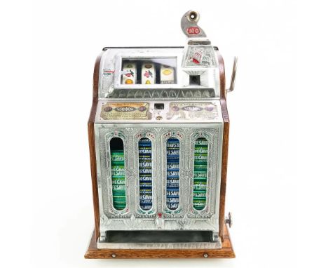 Mills 10 cent FOK slot machine with 4 mint vendors. Older restoration. Accepts coins, runs strong and pays out. Location: The