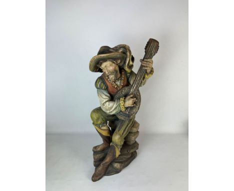 A beautiful contemporary wooden mandolin player figure carved by Patrick Demetz in Val Gardene, Italy. The Demetz family is o