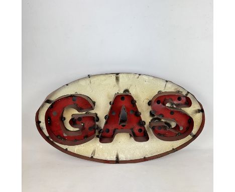 Metal GAS Light-up Advertising Sign. Dimensions (H x W x D): 44 x 78 x 7 cm. Location: The Netherlands.