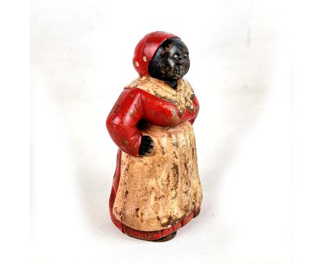 This is an antique cast iron mechanical coin bank featuring a classic "Mammy" design, a popular collectible from the late 19t