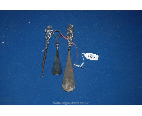 Two Silver handled Shoe Horns and a button hook