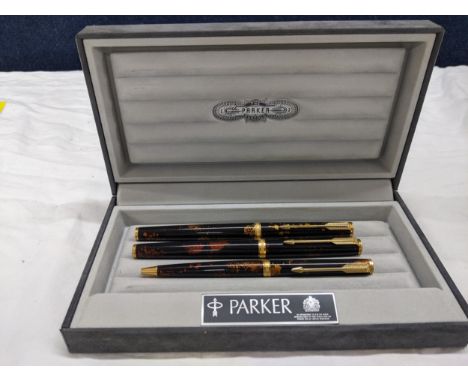 A boxed Parker Premier Chinese lacquer fountain pen, rollerball and ballpoint pen set, the rollerball and ballpoint are witho