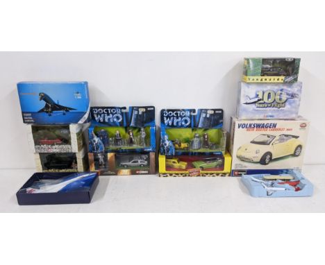 A collection of boxed model vehicles and figures mainly from TV shows - Triumph Herald convertible and Edie Pegden figure fro