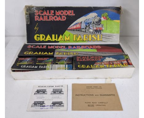 A scale model railroad by Graham Farish to include track and Graham Farish carriages, also including some Triang passenger ca