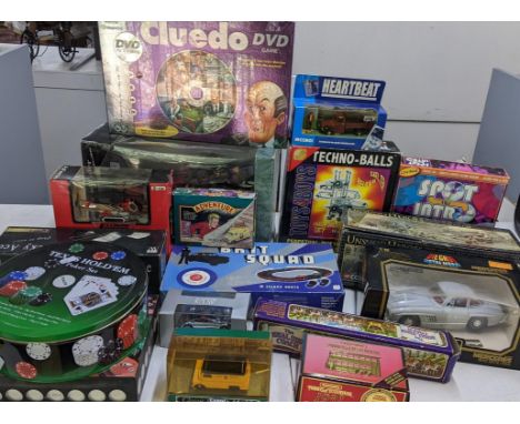 A mixed lot of games and model toys to include Cluedo, boxed Diecast Mercedes, poker set and other itemsLocation:If there is 