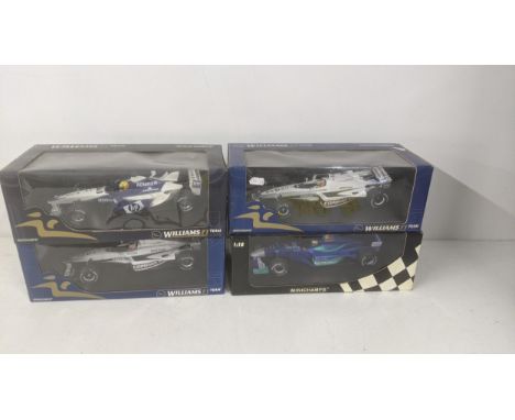 Four boxed Minichamps 1/18 scale Formula 1 racing carsLocation: 11-3If there is no condition report, please request.