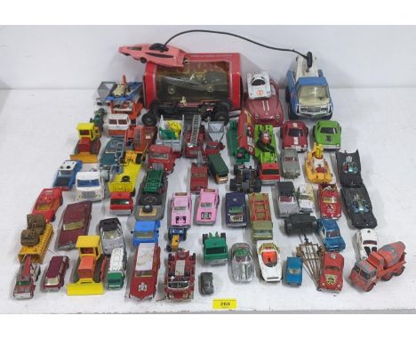 A collection of Corgi, Dinky and Matchbox model vehicles to include an Oldsmobile Tornado, a K-21 Cougar Dragster, a K-32/40 