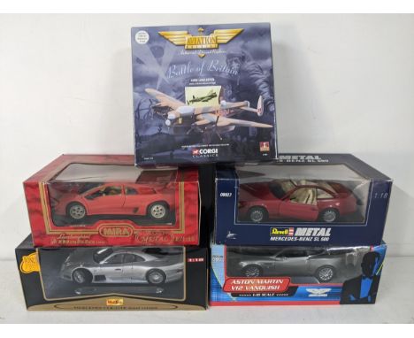 Five model vehicles to include a Maisto Mercedes CK - GTR street version, an Aston Martin V12 Vanquish from the 007 James Bon