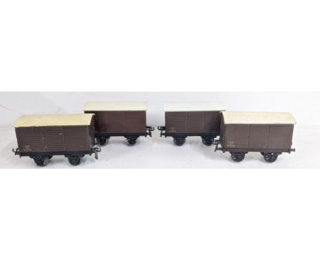Four Bassett – Lowke hard top cargo train carriages (LMS 12T 91375) Location:If there is no condition report, please request.