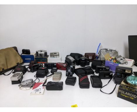 A mixed lot of vintage film and digital cameras to include a Polaroid 636 Cloe Up, Nikaiiyo FMD System, Olympus U(Mju:) -1, A