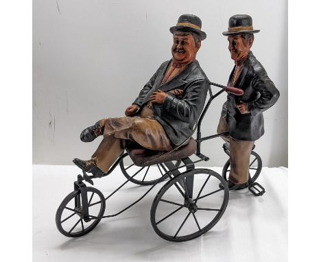 A painted composition model of Laurel and Hardy on a tricycle A/F, 46cm highLocation:If there is no condition report shown, p