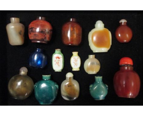 A box of fourteen snuff bottles  