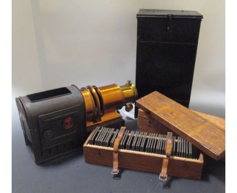 A Magic Lantern and two cases of assorted slides  