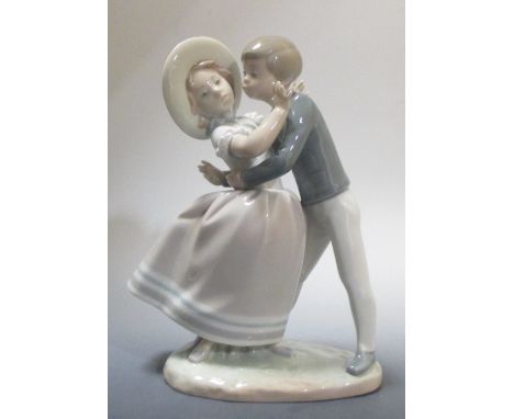 A Lladro figure of a couple dancing, 25cm tall  