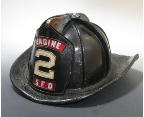 An American Seattle Fire Officers helmet, with a label to interior 'Cairns Brothers, Clifton, New Jersey'  