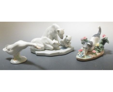 A Lladro group of three polar bears, a goose and a kitten looking at a frog (3)  
