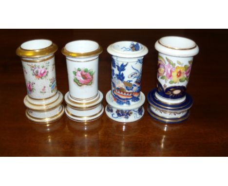 Three Spode and a Mayer and Newbold spill vase, each with rolled rims above flower decorated cylindrical bodies, the Spode 10